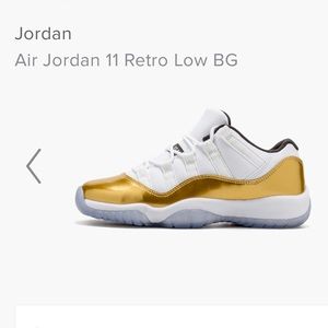 Jordan 11 Low white and metallic gold color.